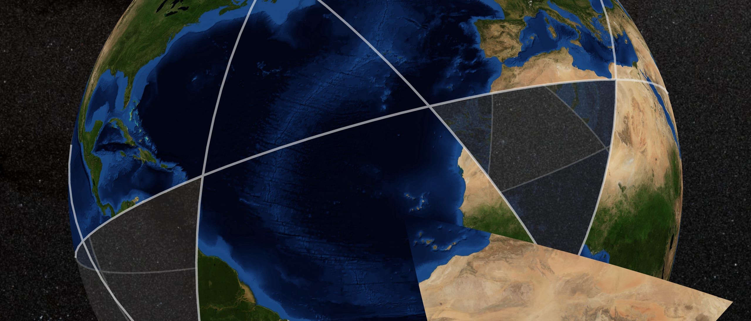 Earth as a globe of curved pieces, the Atlantic between the Americas and Africa, with one piece lifted away carrying the Sahara.