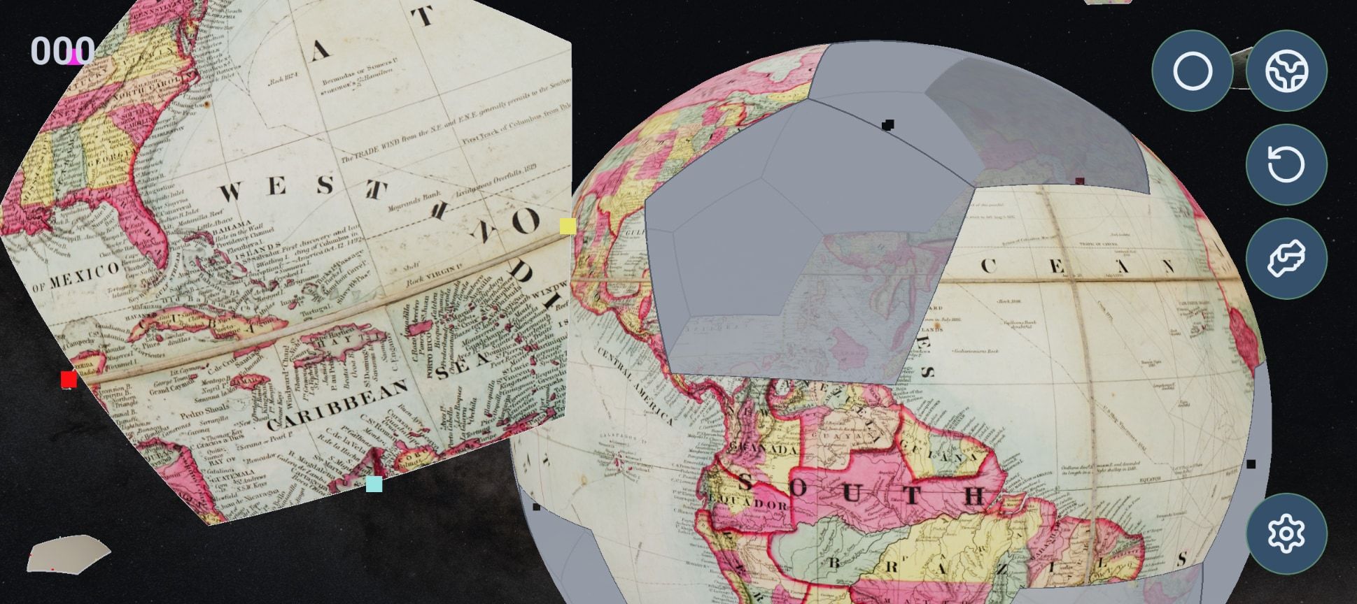 A grey sphere half covered by pieces of Colton's 1855 map, South America on its face, and one large piece of the Caribbean lifted beside it.